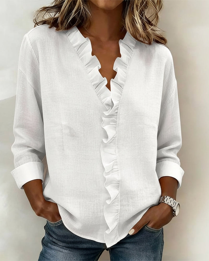 Blusa con volantes, escote en V y manga larga