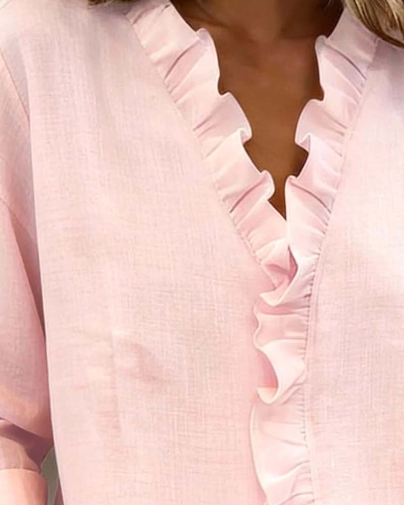 Blusa con volantes, escote en V y manga larga