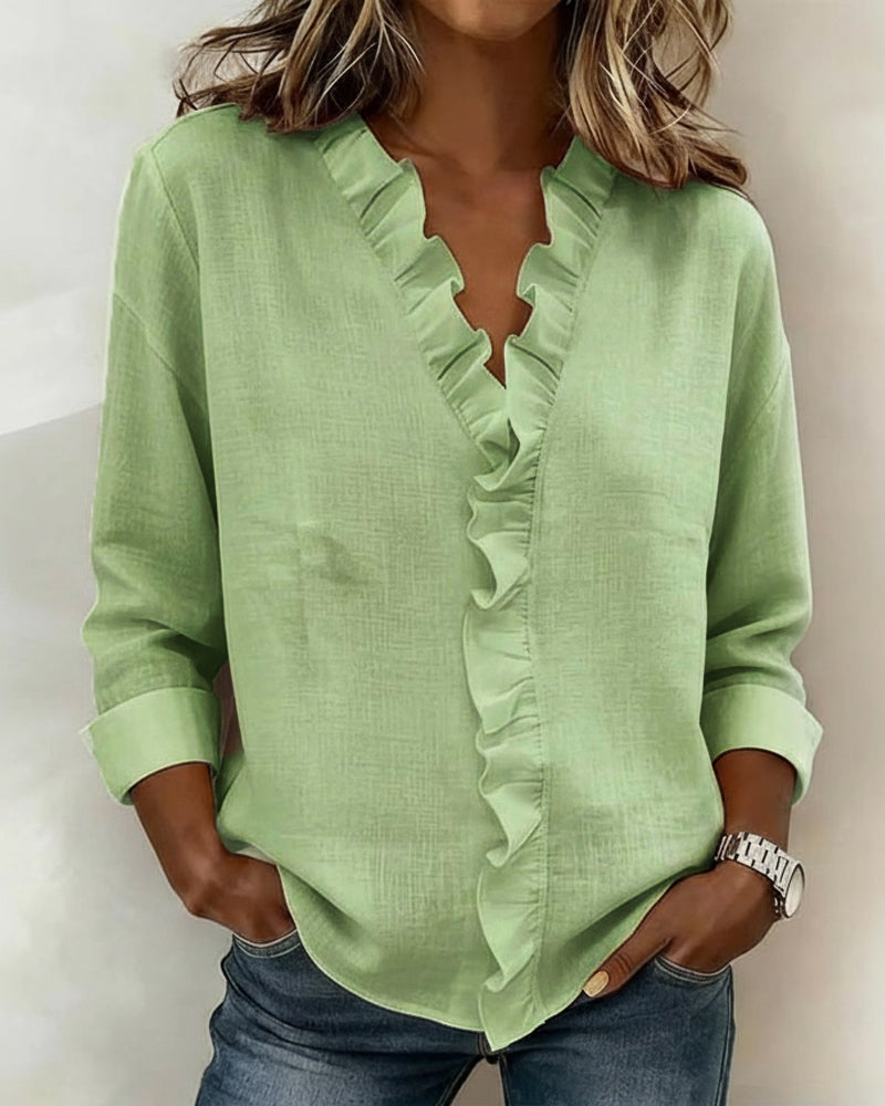 Blusa con volantes, escote en V y manga larga