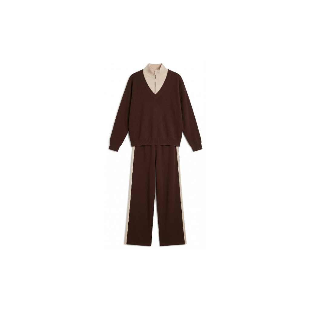 Conjunto de mujer compuesto por blusa de manga larga con solapa y pantalón.