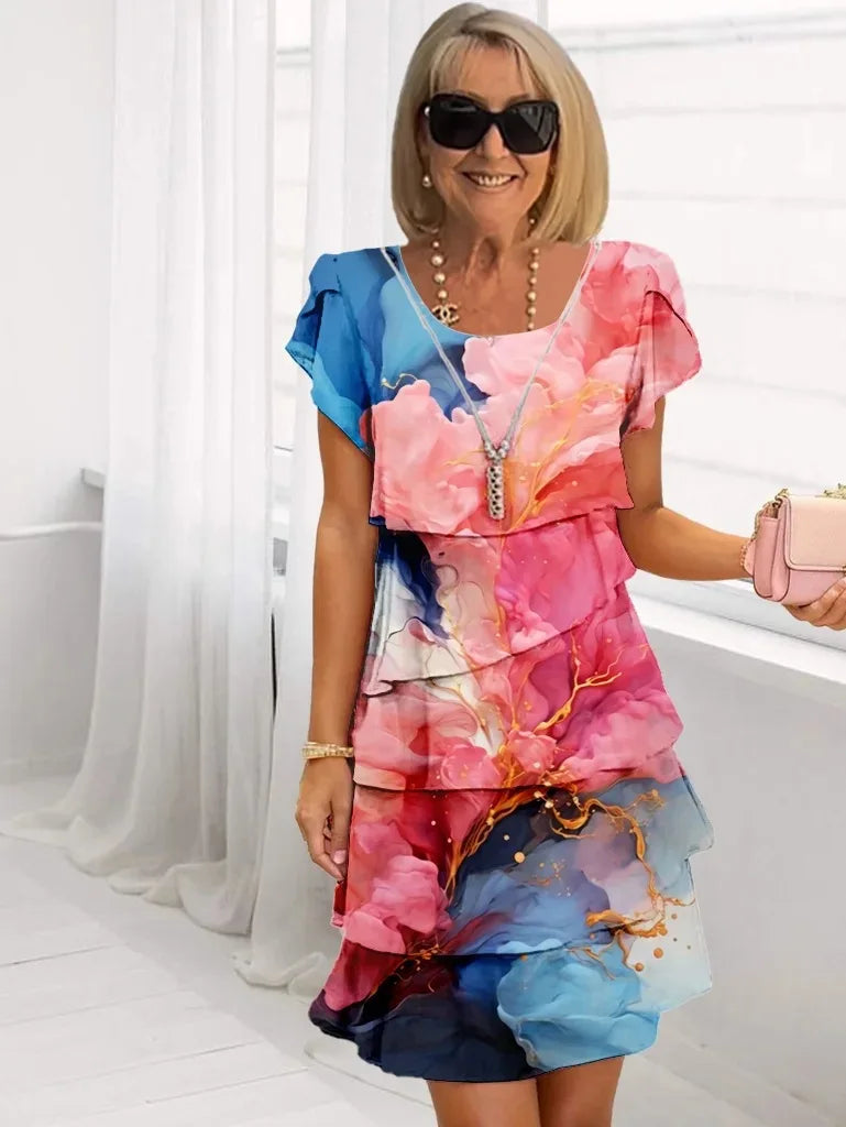 Adela – Vestido elegante y fluido con volantes