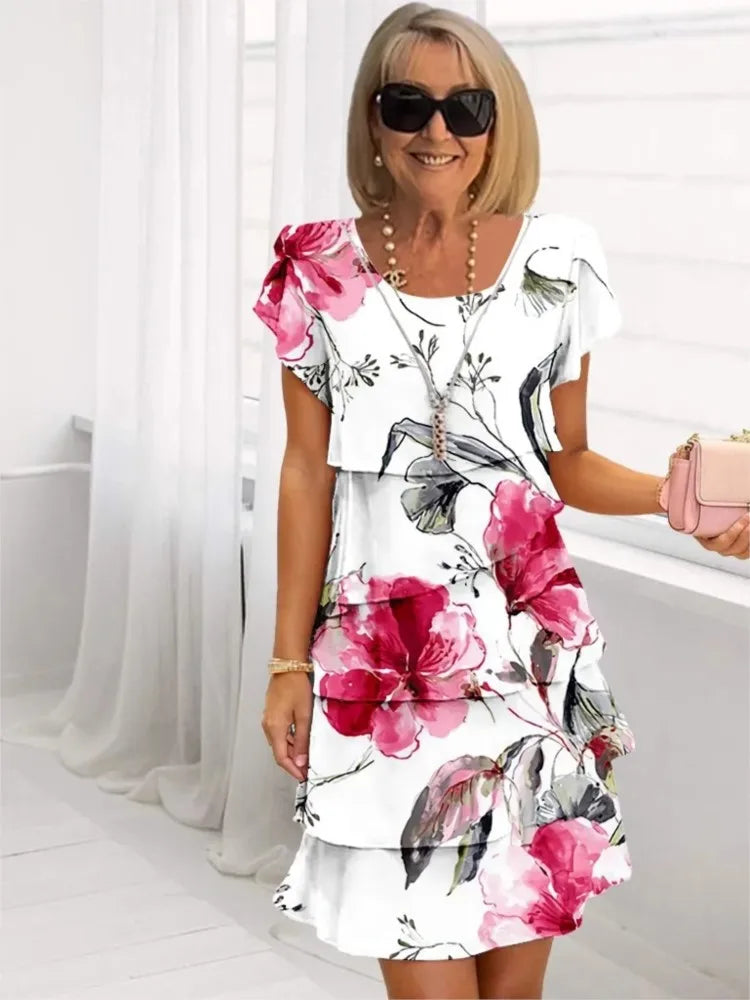 Iria– Vestido elegante y fluido con volantes