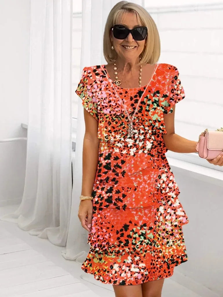 Irene – Vestido elegante y fluido con volantes