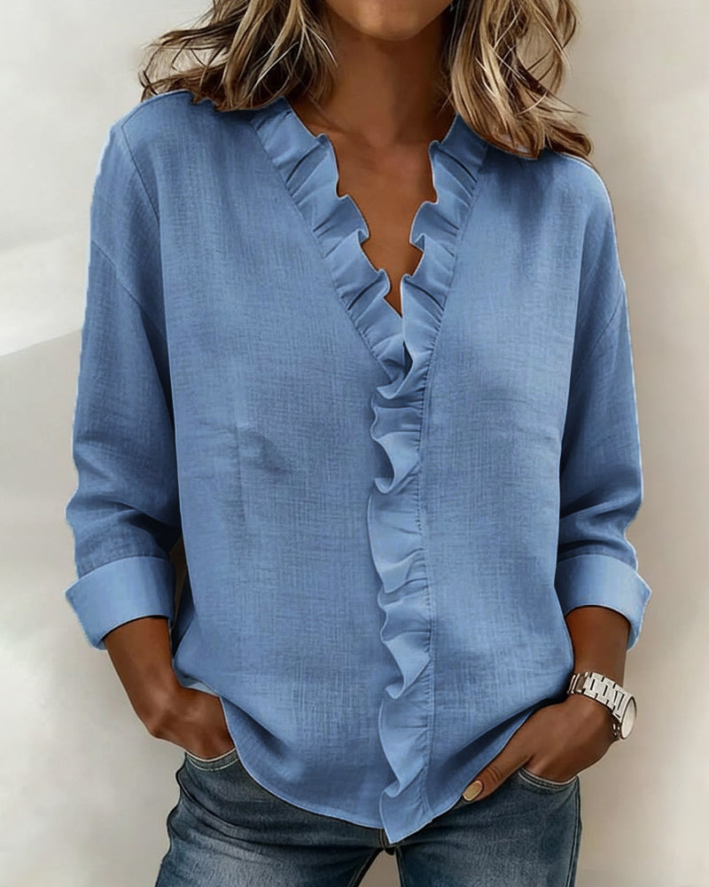 Blusa con volantes, escote en V y manga larga