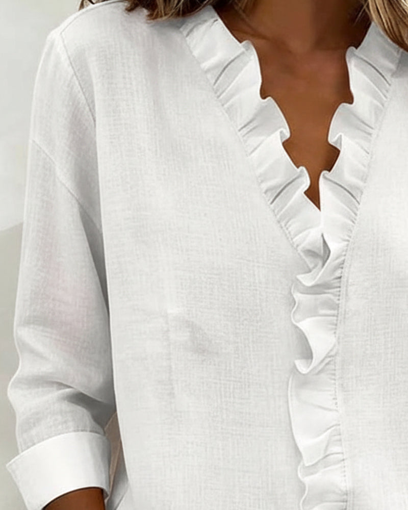 Blusa con volantes, escote en V y manga larga