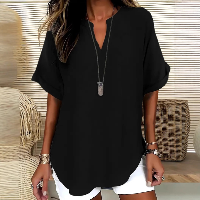Blusa de manga corta holgada de color liso a la moda.