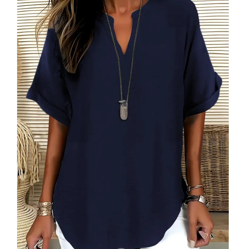 Blusa de manga corta holgada de color liso a la moda.