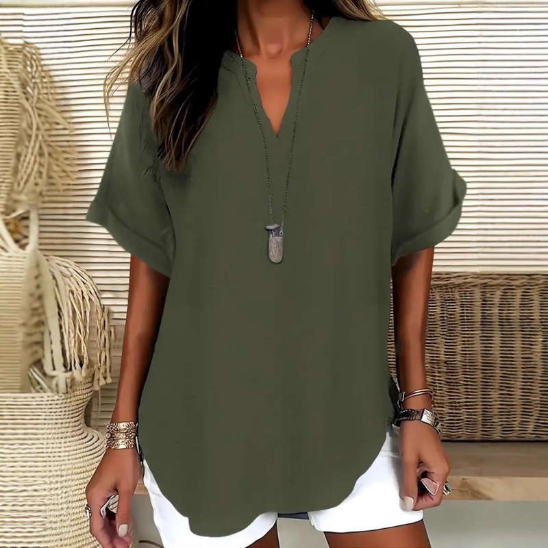 Blusa de manga corta holgada de color liso a la moda.