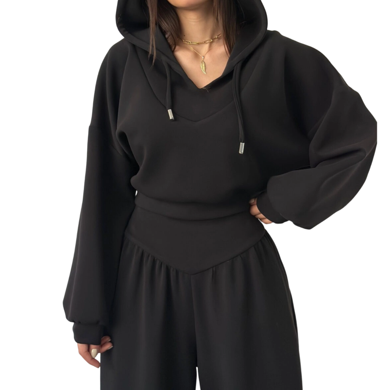 Conjunto para mujer compuesto por una sudadera corta con capucha y pantalones de pierna ancha